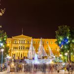 A traditional Greek boat with Christmas lights outside the Parliament in Syntagma Square Athens, a Greek Christmas Tradition
