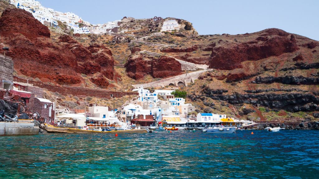 Ammoudi bay in Santorini as seen from the sea.
