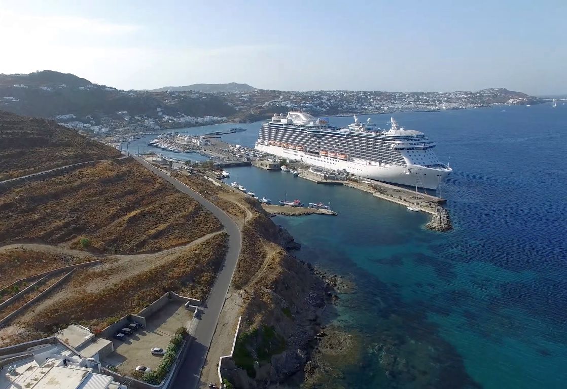 A cruise ship docked at the new port of Mykonos